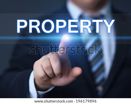 business, technology, internet and networking concept - businessman pressing property button on virtual screens