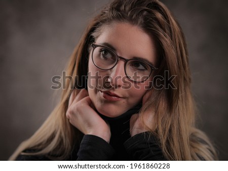 Young pretty woman in her mid 20s - portrait shot - studio photography