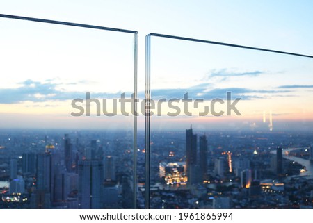 Frameless laminated glass balcony three layer. Royalty-Free Stock Photo #1961865994