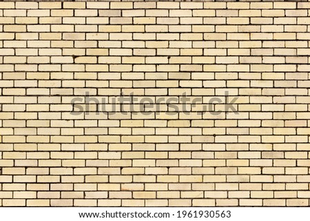 Light Yellow Brick Wall Pattern Background From a Distance Royalty-Free Stock Photo #1961930563