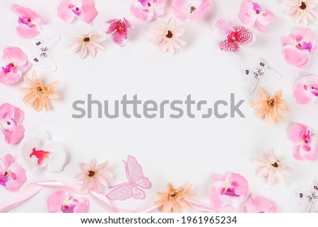 Holiday concept with flowers, spring or summer composition, still life, banner, flat lay of delicate orchid flowers with place for text. Greeting card for mother's day, women's day, ,
