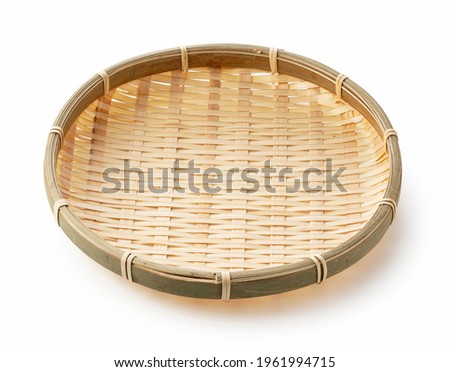 Bamboo basket placed on a white background.Bamboo basket plate for Zaru Soba

 Royalty-Free Stock Photo #1961994715
