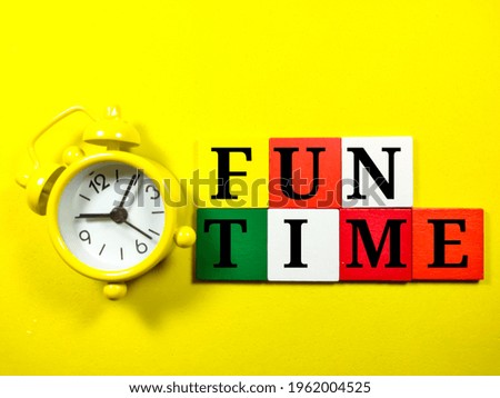 Text FUN TIME with clock on yellow background.