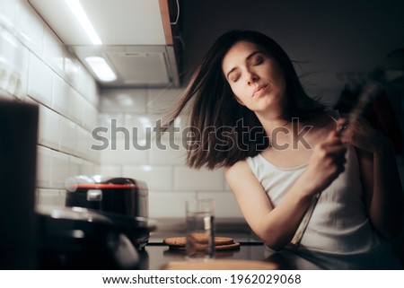 Woman Fanning herself During Nigh Time Complaining of Heat. Young person can not sleep in overheated apartment with broken air conditioner
 Royalty-Free Stock Photo #1962029068