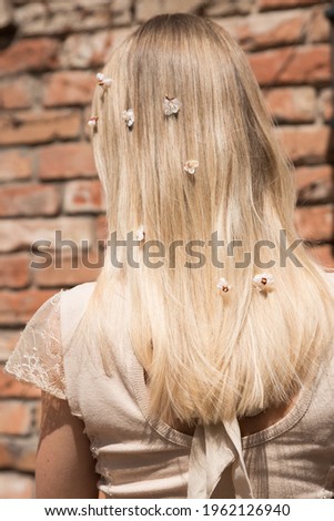 young girl with flowers in her hair