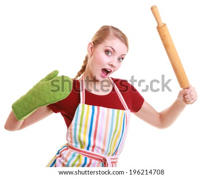 Funny crazy emotional housewife or baker chef wearing kitchen apron green oven mitten holds baking rolling pin studio picture isolated on white