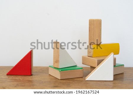 Colorful building blocks placed on a white background