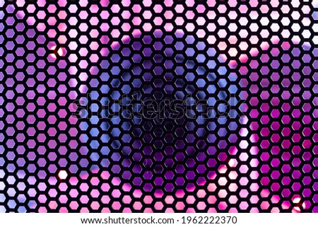 Macro Detail of the case of a gaming pc with fan illuminated by rgb led and protection net Royalty-Free Stock Photo #1962222370