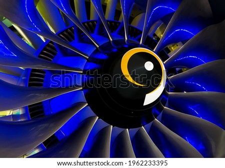 Close-up of a large jet engine turbine blades Royalty-Free Stock Photo #1962233395