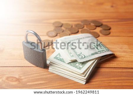 lock and money on the table