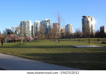 People are resting in the city park. Vancouver. Canada.