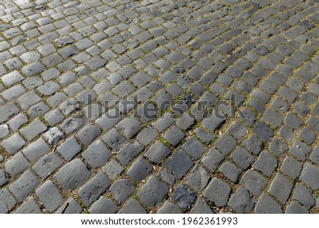 harmonic pattern of old cobble stone street