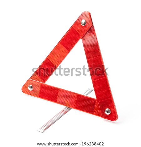 Photo of red emergency road triangle isolated on white.