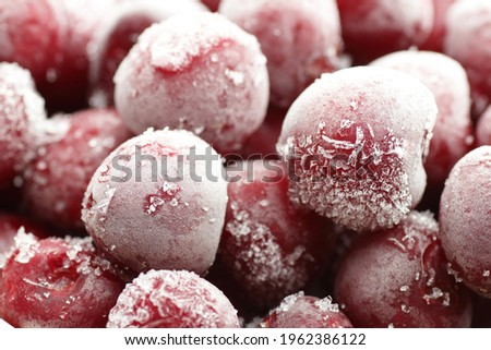 Macro of frozen berries - sweet cherries, closeup, background texture, food storage, saving leftovers, healthy organic food concept