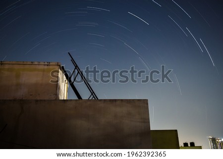 Capturing star trails on a clear night sky