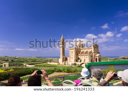 Tourists taking pictures of The National Shrine of the Blessed Virgin of Ta' Pinu, Gozo, Malta