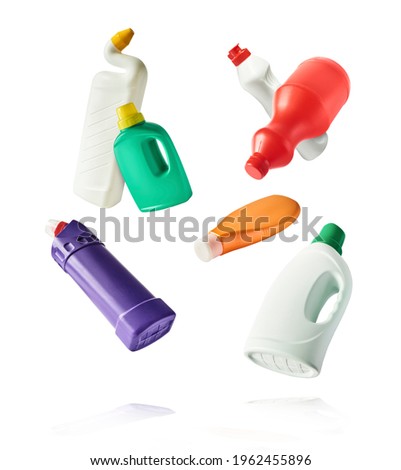 Household cleaning product. A plastic bottle falling in the air isolated on white background. Product mockup for your brand Royalty-Free Stock Photo #1962455896