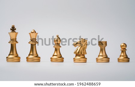 Golden chess include king queen horse ship and pawn on white background. Royalty-Free Stock Photo #1962488659