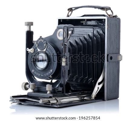 on old vintage camera from 1928 isolated on a white background