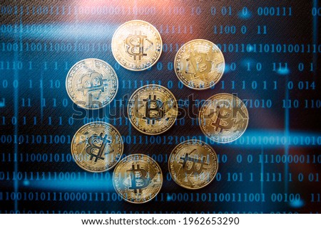 Businessmen hold dollars.Gold Bitcoin with electronic computer processor board.Digital money Digital currency Trading and investment concept.