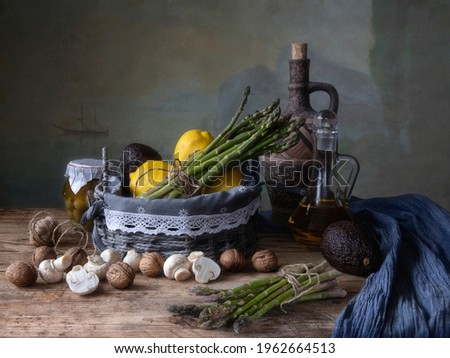 Still life with asparagus and fruits