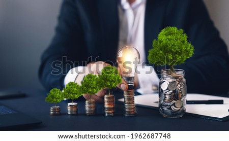 Concept of pass and increase of renewable energy. Alternative sources of energy. Green energy, eco energy. Eco business investment Royalty-Free Stock Photo #1962687748