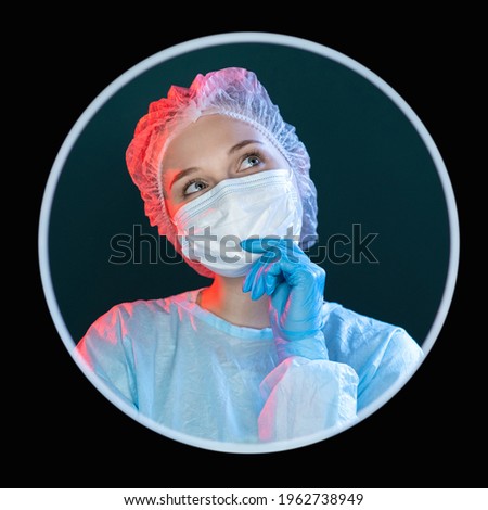 Thoughtful doctor. Medical research. Treatment solution. Headshot portrait of daydreaming female nurse in blue ppe face mask gloves in round frame avatar isolated on black.