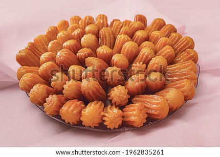 Balah El Sham Ramadan Arabic Sweets isolated Royalty-Free Stock Photo #1962835261