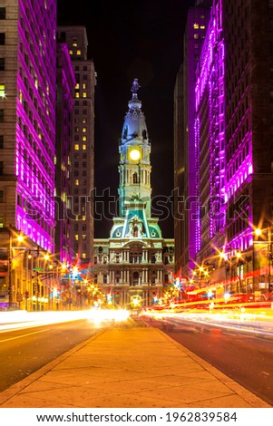 A vertical shot of the illuminated Museum of Art building at night in downtown Philadelphia, USA