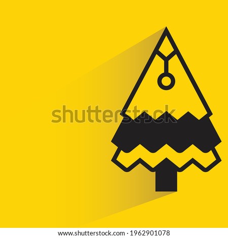 pine and Christmas tree on yellow background