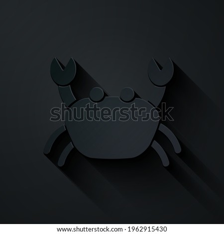 Paper cut Crab icon isolated on black background. Paper art style. Vector