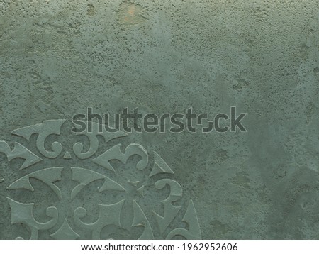 The texture of the wall is decorated with abstract decorative plaster
