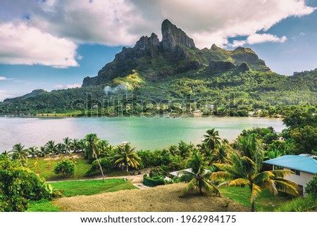 Bora Bora and Mount Otemanu nature landscape in Tahiti, French Polynesia with coral lagoon sea and Mt Pahia, Mt Otemanu, Tahiti, south Pacific Ocean Royalty-Free Stock Photo #1962984175