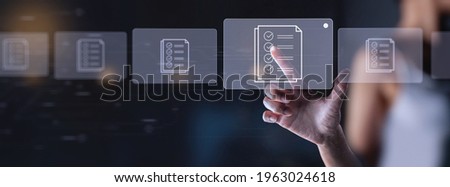 compliance rules and law regulation policy concept businesswoman working modern computer on virtual screen, documents with checkbox lists. Royalty-Free Stock Photo #1963024618