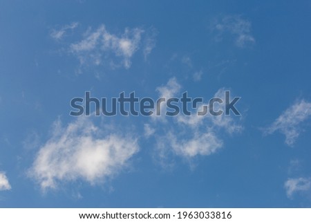 Soft white clouds texture on beautiful afternoon sky background. Image for background design The clear sky makes you feel fresh and clear.