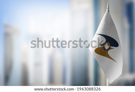 Patch of the national flag of the Eurasian Economic Union on a white t-shirt Royalty-Free Stock Photo #1963088326
