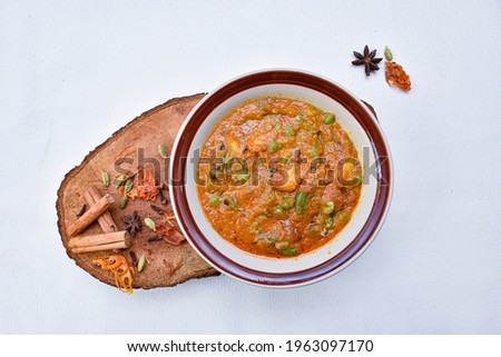 Mix vegetable curry with spicy and white background and wooden try
