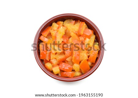 Orange peel jam in a clay bowl, isolated on white background