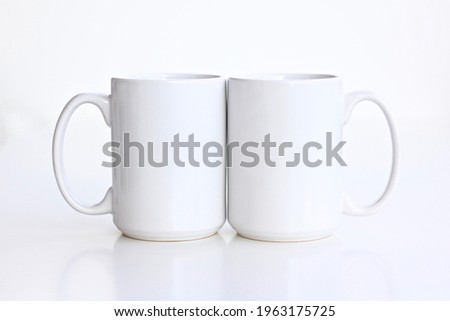 2 Large Blank coffee mug isolated on white background. Template of drink cup for your design. 15 oz mug mock up Royalty-Free Stock Photo #1963175725