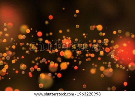 Warm orange and red bokeh lights or circles effect concentrated on center. Background or overlay layer. Color Dodge or screen blend. Festive celebration theme.