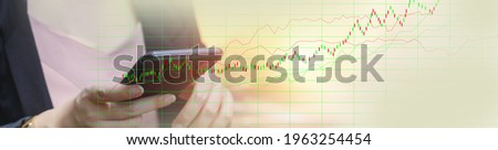 Close up smartphone in hand business woman with stock chart, candlestick chart, analysis market graph. Banner size with copy space.