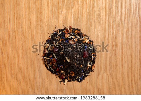 Dried teas on a wooden board. selective focus. blur background.
