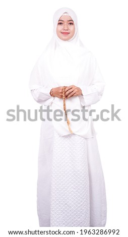 Asian women muslim pray on a white background
