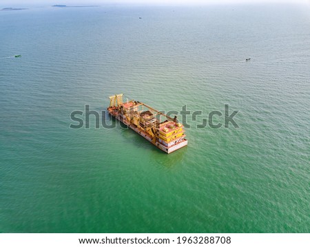 Aerial photography of giant oil tanker sand mining ship at sea