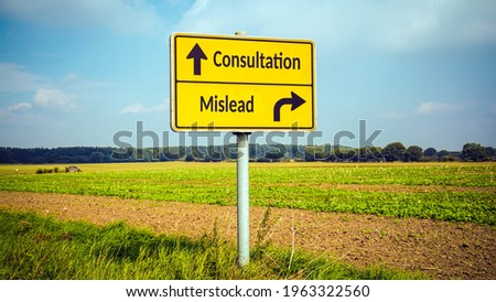 Street Sign the Direction Way to Consultation versus Mislead Royalty-Free Stock Photo #1963322560
