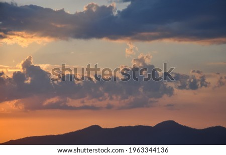 High resolution beautiful view of colorful clouds and sky during sunset of hilly area, Sunset of summer season. 