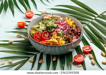 Organic hawaiian chicken poke bowl with rice and vegetables