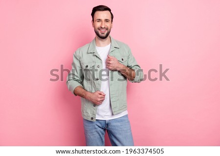 Portrait of attractive cheerful brunet guy wearing good look cosy clothes posing isolated over pink pastel color background Royalty-Free Stock Photo #1963374505