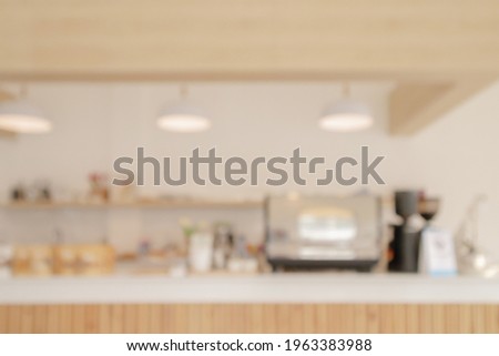 Coffee shop or cafe restaurant interior blur for background Royalty-Free Stock Photo #1963383988