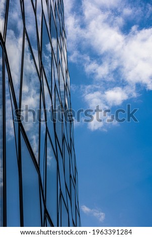 Modern Architecture glass facades with sky reflection